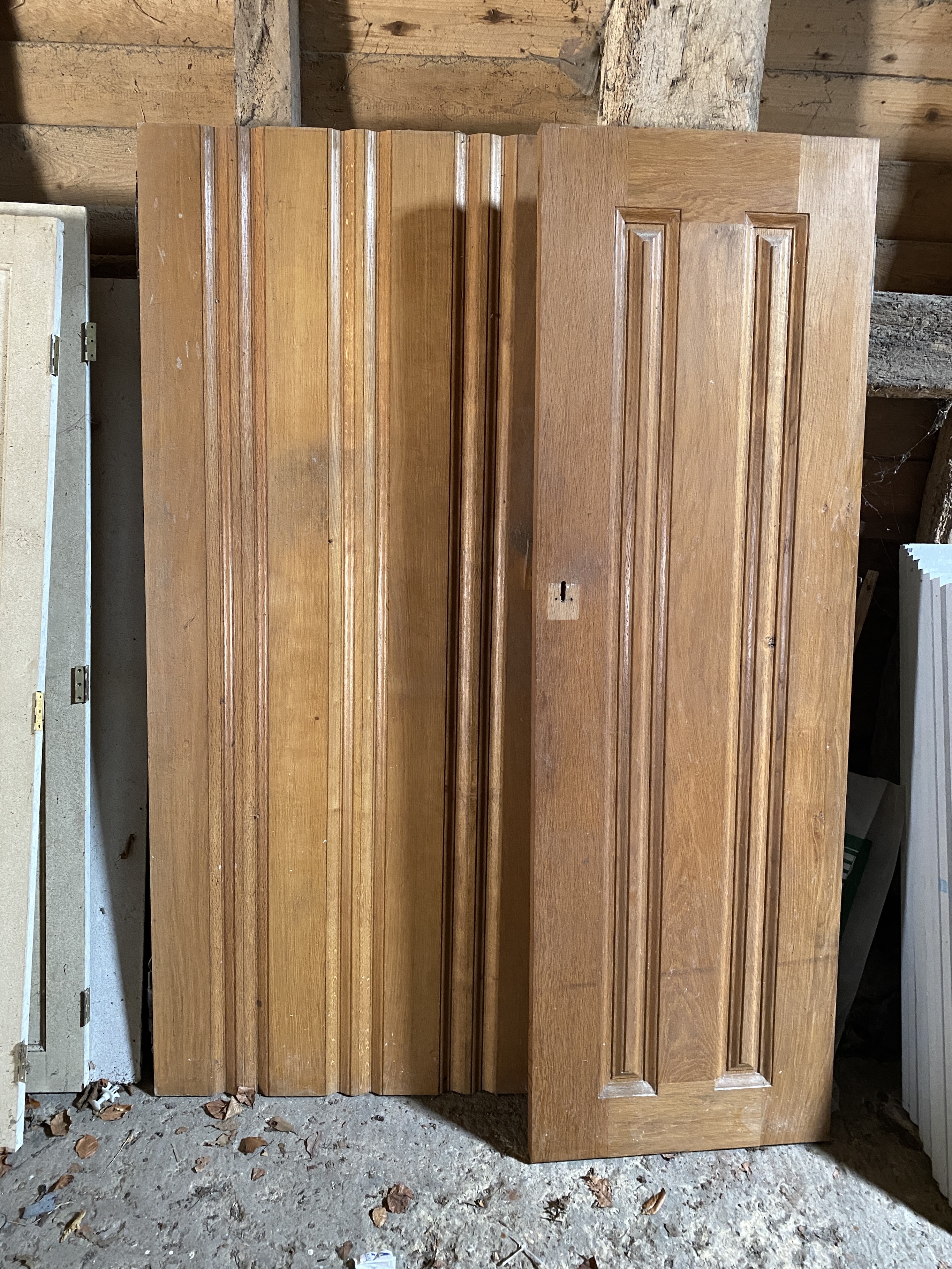 Four panelled solid oak doors, 210 x 86.5cm; 200 x 62.5cm; 171 x 63.5cm and 72 x 63.5cm